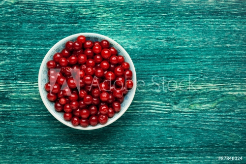 Cherries on wooden table with water drops macro background - 901144968