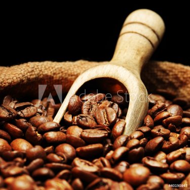 Coffee beans on burlap sack - 900634761