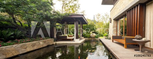 design and furniture in rest place with pond