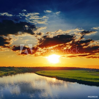 dramatic sunset over river - 900446501