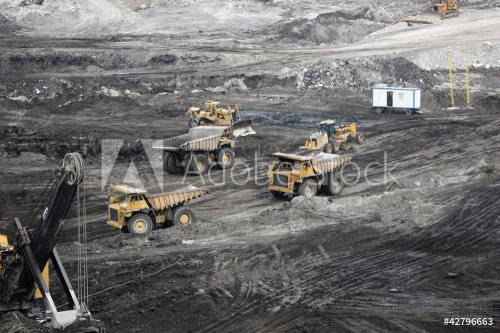 earth moving equipment in an open cast mine - 900458220