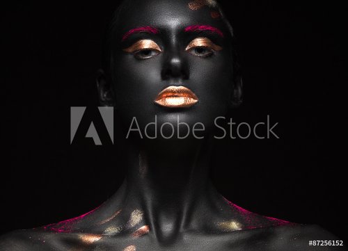 fashion portrait of a dark-skinned girl with color make-up - 901153342