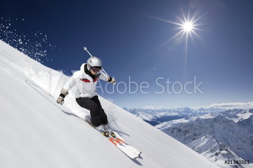 Female skier with sun - 900053392