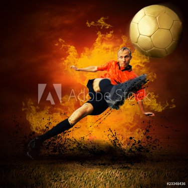 Football player in fires flame on the outdoors field - 900059065