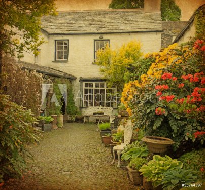 garden at the front of  old house, Lake District, UK.