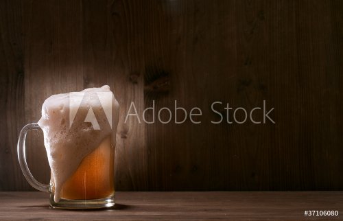 Glass beer on wood background - 900738582
