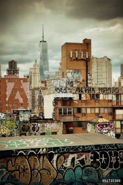 Graffiti and urban buildings in downtown Manhattan. - 901147065