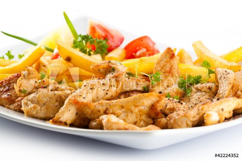 Grilled meat French fries and vegetables on white background - 900438279