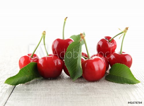 heap of cherries and leaf - 900421938