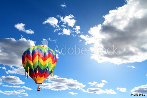 hot air balloon over cloudy sky