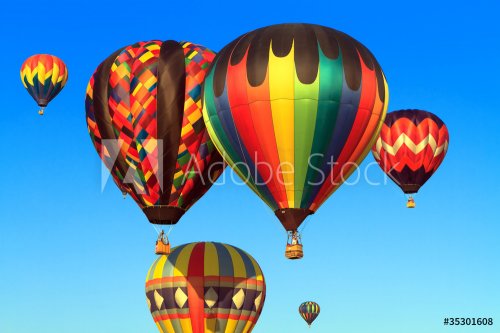 hot air balloons over blue sky - 900082151