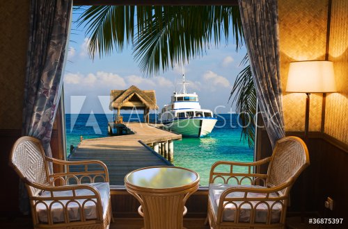 Hotel room and tropical landscape - 901145572