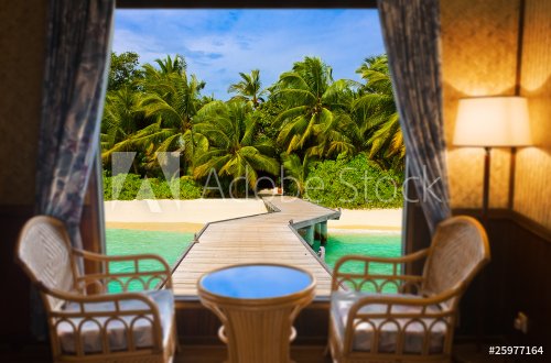 Hotel room and tropical landscape - 901145577