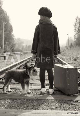 Little girl traveling with her dog. The old European photo. - 901144090