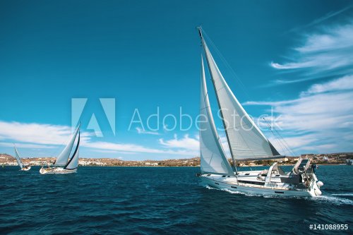 Luxury yachts at regatta. Sailing through the waves at the Aegean Sea. - 901149490