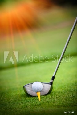 Macro shot of a golf club ready to drive the ball - 900429259