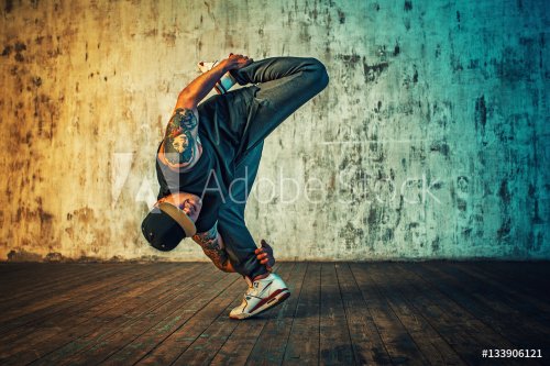 Man dancing on wall background
