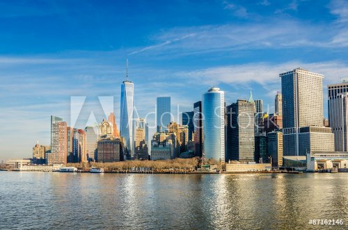 Manhattan Skyline and Reflection in Water on a Winter Morning