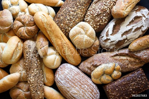 Many mixed breads and rolls shot from above. - 901152424