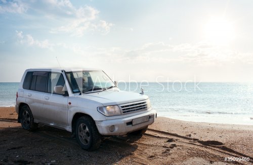 off-road vehicle on the beach - 900723691
