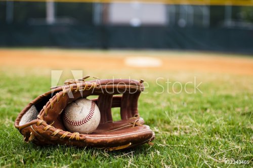 Old Baseball and Glove on Field - 901148528