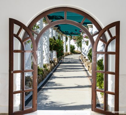 open door arch with access to the alley