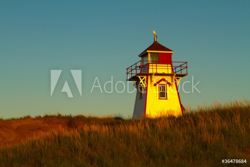 PEI Lighthouse lit by the Setting Sun - 900093311