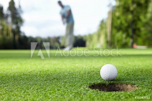 Playing golf - 900257158