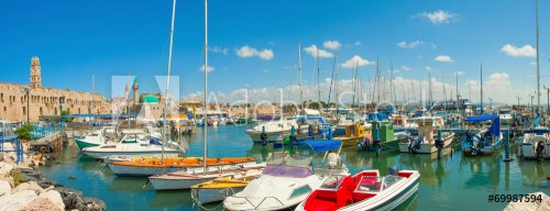 Port of Acre, Israel. with boats and the old city - 901145602