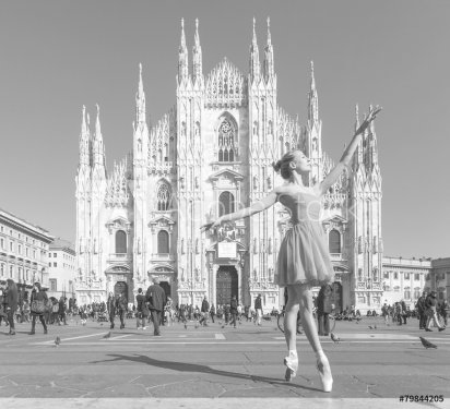 Pretty dancer performing in Milan Cathedral Square black and whi