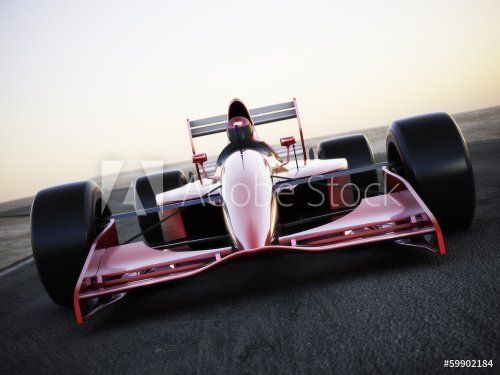 Race car racing on a track front view with motion blur - 901143267