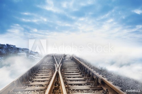 Railway tracks leading to clouds - 901140980