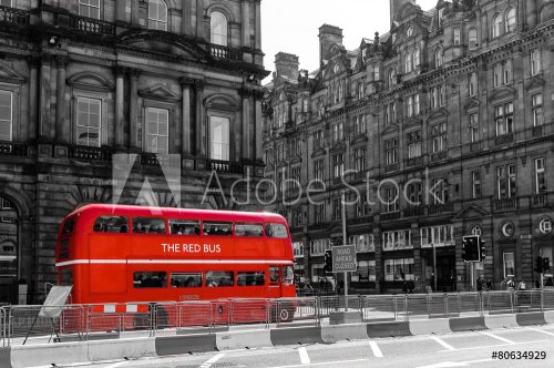 red double decker vintage bus in a street - 901146011