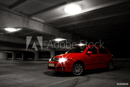 red hatchback car on black and white background - 901153330