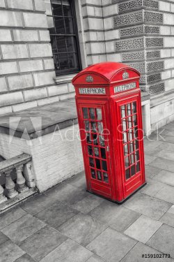 red telephone box in westminster, London