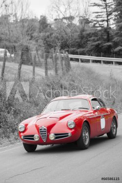 Red vintage car on black and white background - 901153062
