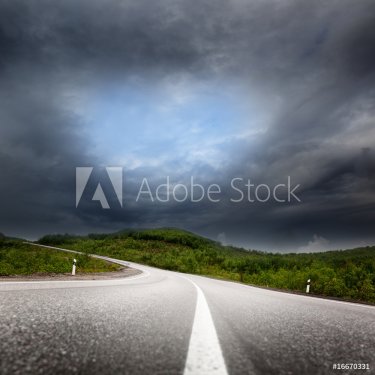 road and black clouds