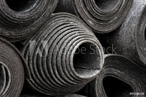 rolls of black foam