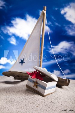 Sailboat on sand on beach Background - 900458184