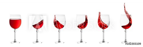 set of wine glasses with splashes of wine isolated on white back