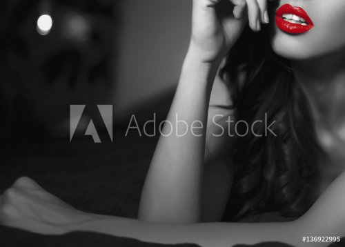Sexy woman with red lips in selective black and white template