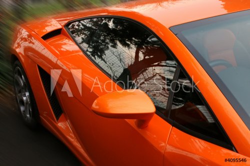 side of orange supercar - 901153269