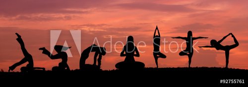 Silhouette of a beautiful Yoga woman - 901147912