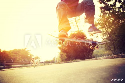 skateboarding jump at park - 901144414