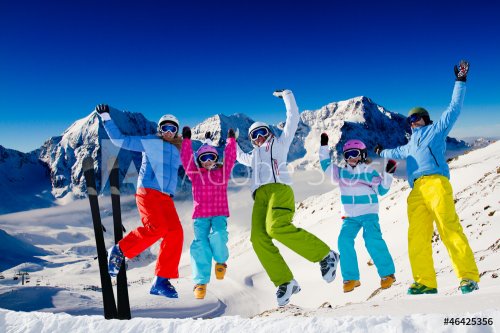 Ski, snow, sun and winter fun - happy family ski team - 900905857