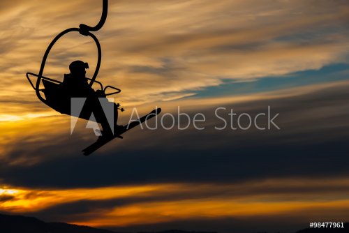 Skier on chair lift - 901146462