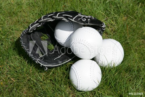 softball glove and balls