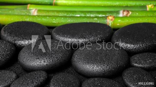 spa concept of zen basalt stones and bamboo with dew, panorama - 901145287