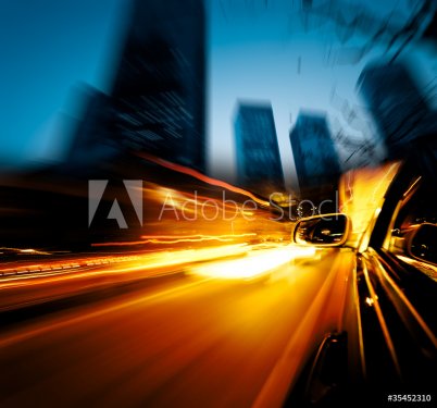 speeding car through city - 900009559