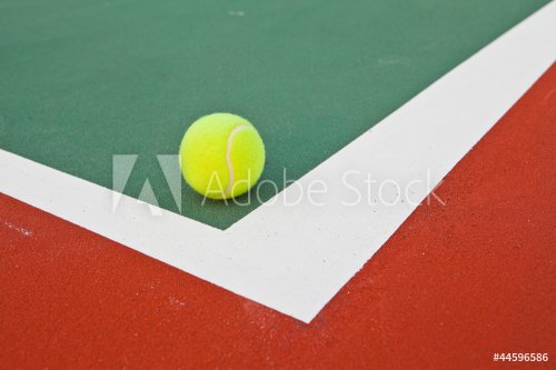 Tennis court at base line with ball - 900663587